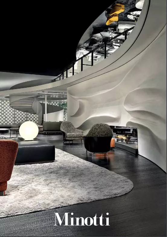 Moderner Showroom mit geschwungener Wandgestaltung, Designermöbeln von Minotti und gemütlicher Wohnraumplanung