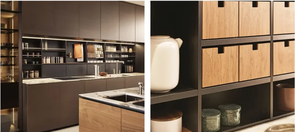 Moderne Poliform Küche mit dunklen Fronten, Holzdetails und Marmorarbeitsplatten im Möbelstudio M-Studio Reiter Altenmarkt
